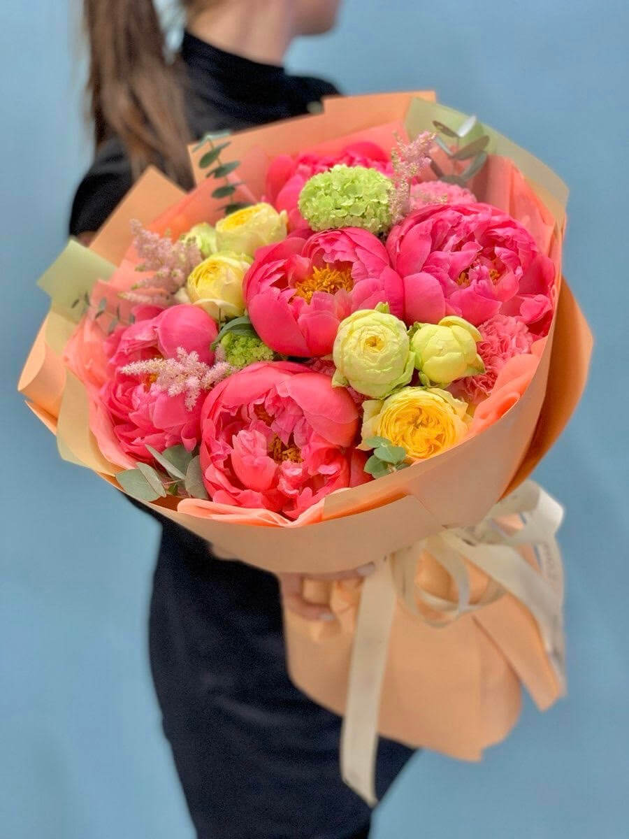 Luxurious bouquet featuring peonies, hydrangeas, spray garden roses, and carnations